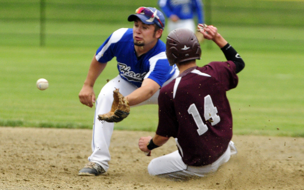 Sacopee Valley shortstop Brady Anderson waits for the throw as Monmouth's Gage Cote slides safely into second during a Class C South semifinal Saturday in Monmouth. No. 4 Sacopee knocked off No. 1 Monmouth in nine innings, 3-2.