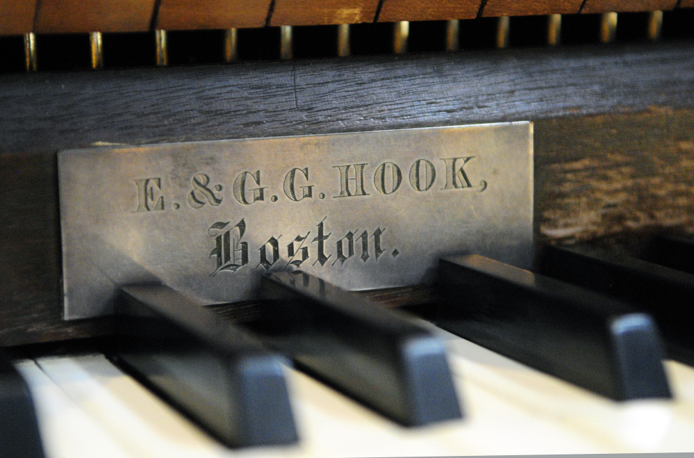 This Thursday photo shows the name plate on the 1866 E. & G.G. Hook tracker organ at the South Parish Congregational Church in Augusta.