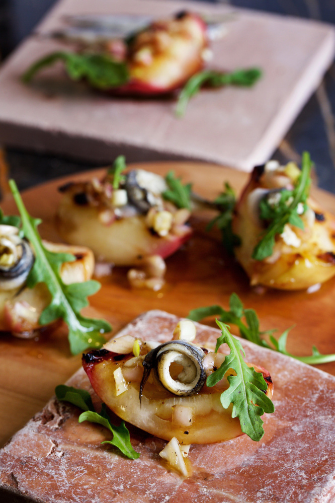 Nectarines with anchovies is a twist on a salad. The Washington Post/Deb Lindsey
