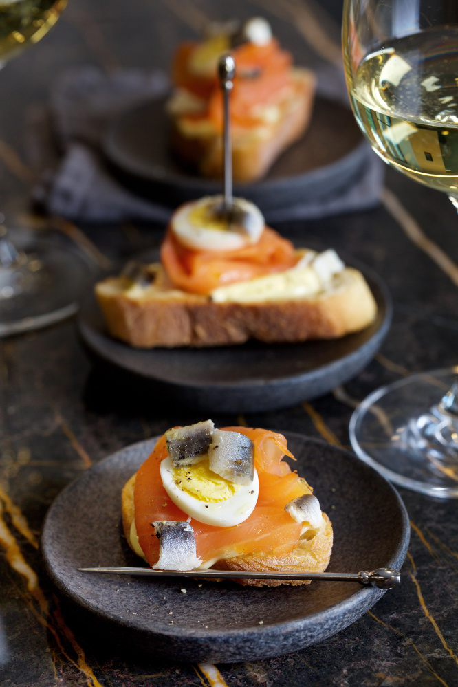 Smoked salmon and quail eggs always delight; the steaming technique called for here keeps them from being overcooked and makes them easy to peel.