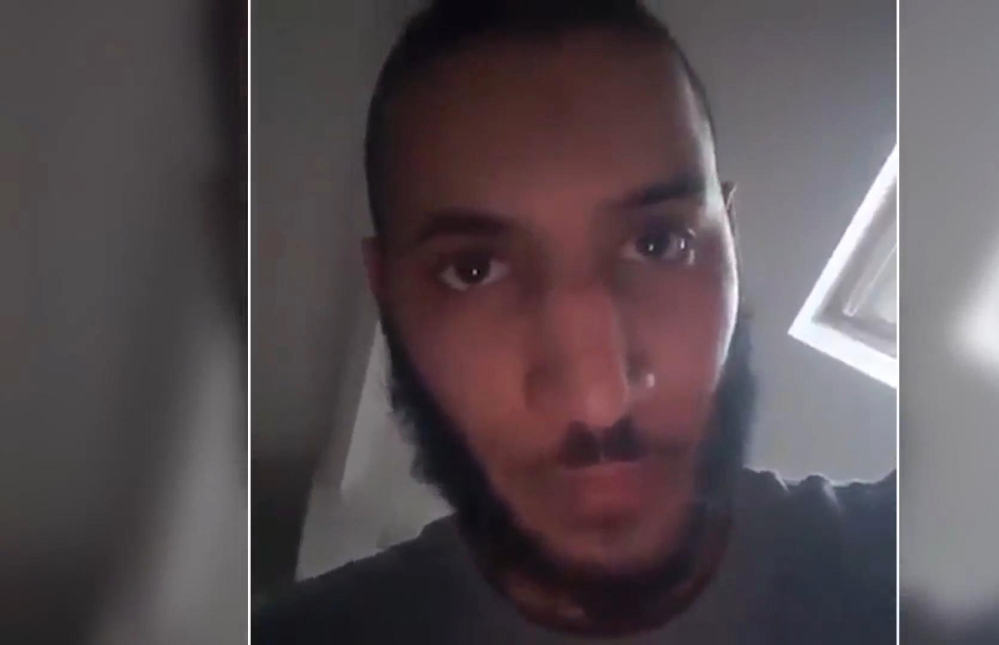 This still taken from a video released Tuesday shows Larossi Abballa, the suspect in the fatal stabbing of a police commander and his companion near Paris.
Islamic State's Amaq News Agency via AP
