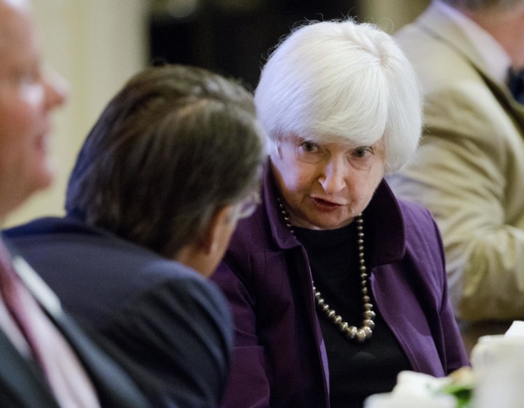 The Federal Reserve, led by Chair Janet Yellen, says in a statement after its latest policy meeting that the pace of job growth has slowed, even as the overall economy has picked up speed.