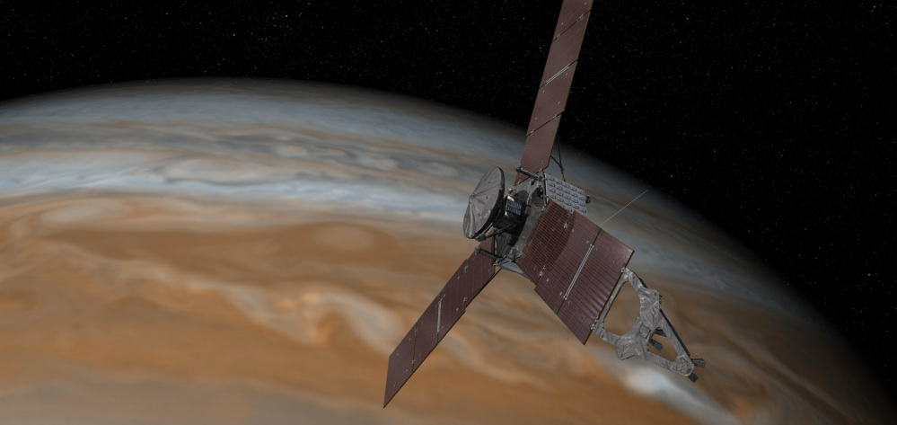 This artist's rendering made available by NASA/JPL-Caltech on July 7, 2015 shows the Juno spacecraft above Jupiter. The spacecraft is scheduled to arrive at the planet on July 4 to begin a nearly year-long study of the gas giant.