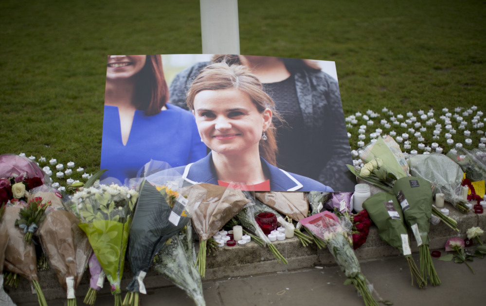 Matt Dunham/Associated Press
Tributes to Jo Cox, the British Member of Parliament stabbed and shot to death in northern England this week, are placed outside the House of Parliament in London on Friday.
