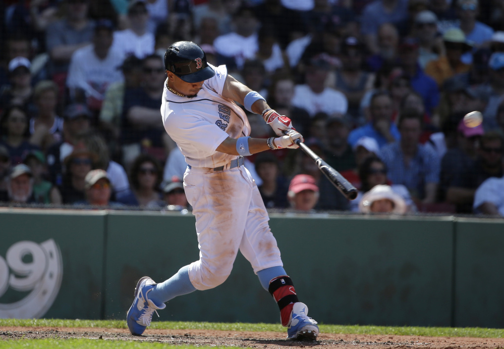 Mookie Betts' solo home run in the seventh inning gave the Red Sox the lead and they held on to beat the Mariners 2-1 on Sunday at Fenway Park in Boston.