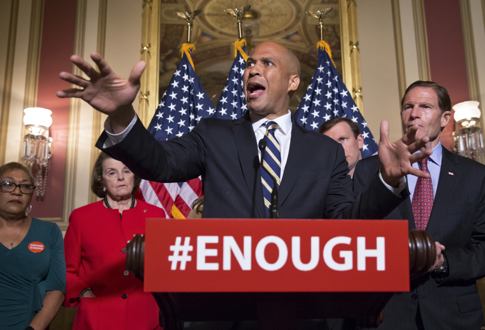 U.S. Sen. Cory Booker, D-N.J., calls for gun control legislation Thursday during a news conference on Capitol Hill in Washington, in the wake of last week's mass shooting in an Orlando, Fla., LGBT nightclub.
