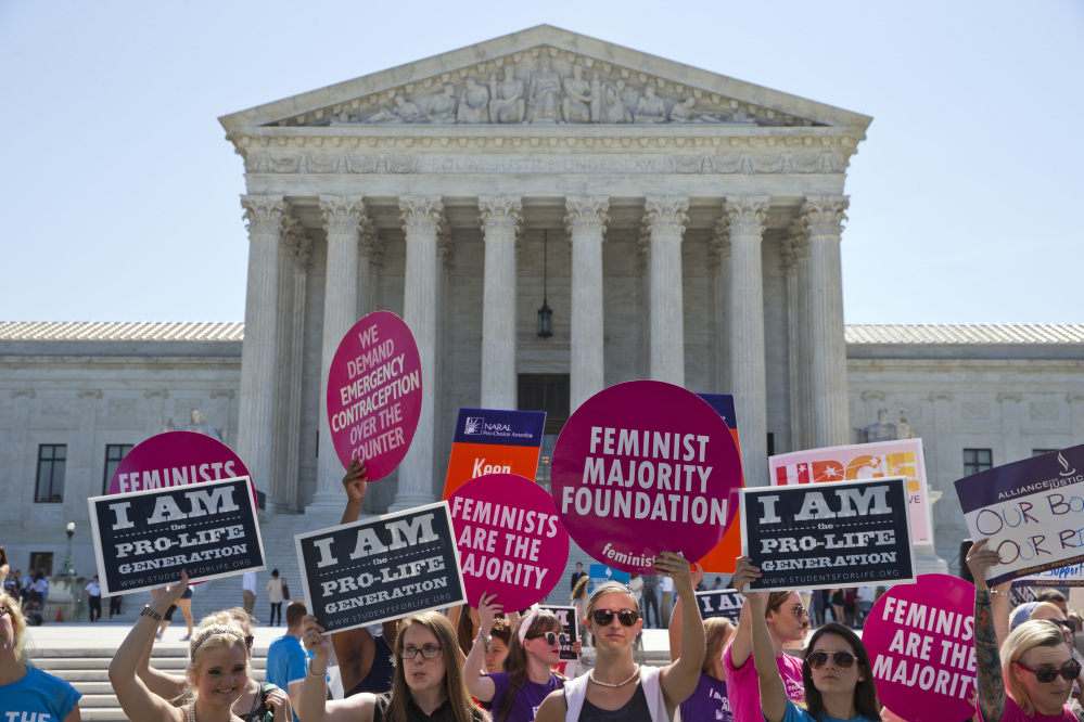 Demonstrators on both sides of the abortion issue stand in front of the Supreme Court in Washington, Monday, June 20, 2016, as the court announced several decisions. glk sugis glius;lgiul;sigu ;lisu g;siu g;ils ug;isu ;ig s;iug;ois ug;iusg