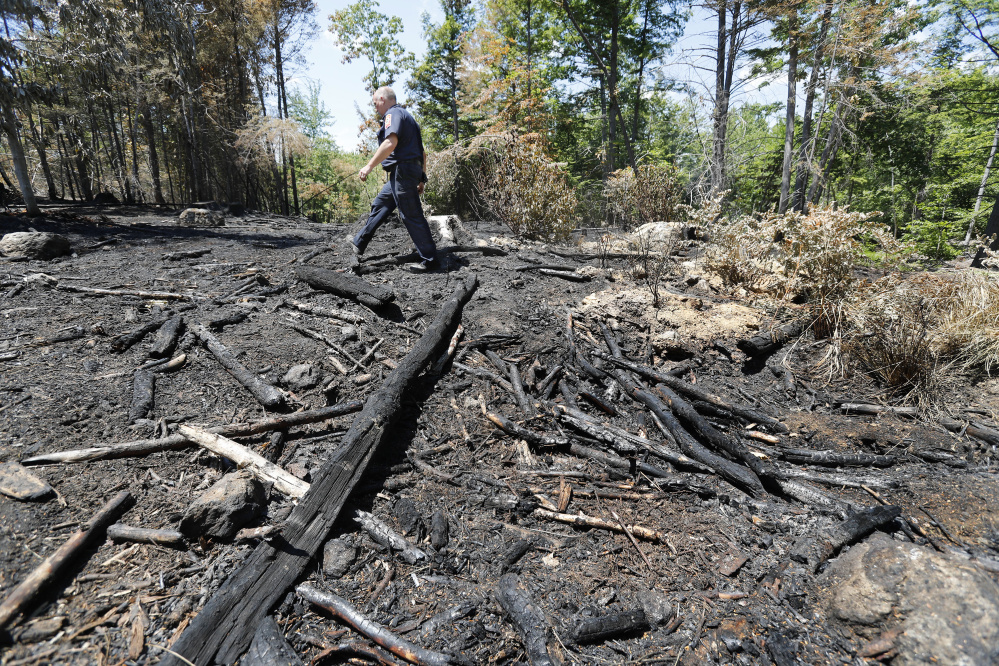 The cause of the Lebanon fire is not known yet, but crews found a discarded cigarette lighter in the burned area and signs that someone had been camping nearby illegally.
