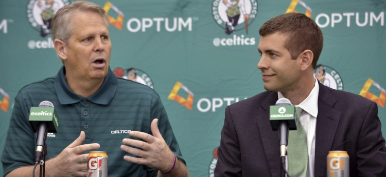 Danny Ainge, left, the president of basketball operations for the Boston Celtics, and Coach Brad Stevens have not only been evaluating the best choice for the No. 3 spot in the NBA draft Thursday night, but the possibilities for making a significant trade.