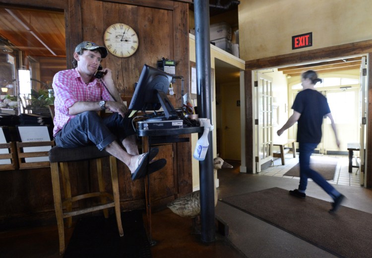 Fore Street's Joshua Dore, one of the few full-time reservationists in Maine, fields hundreds of phone calls a day at the Portland restaurant, which accepts reservations no more than two months in advance.