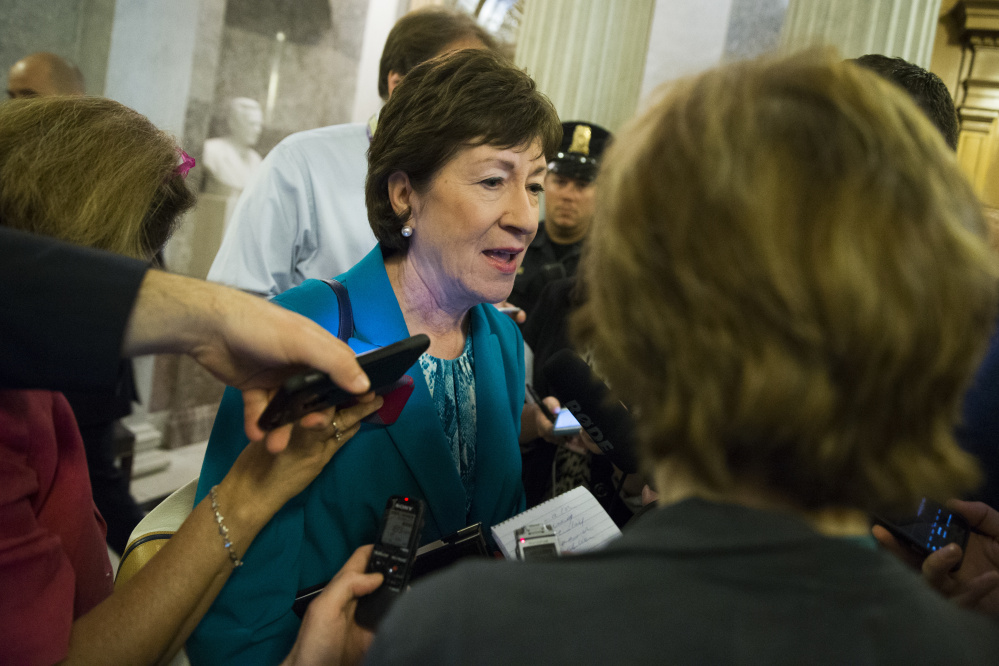 Maine Sen. Susan Collins speaks to reporters Thursday on Capitol Hill about the prospects for her compromise legislation restricting access to guns.
