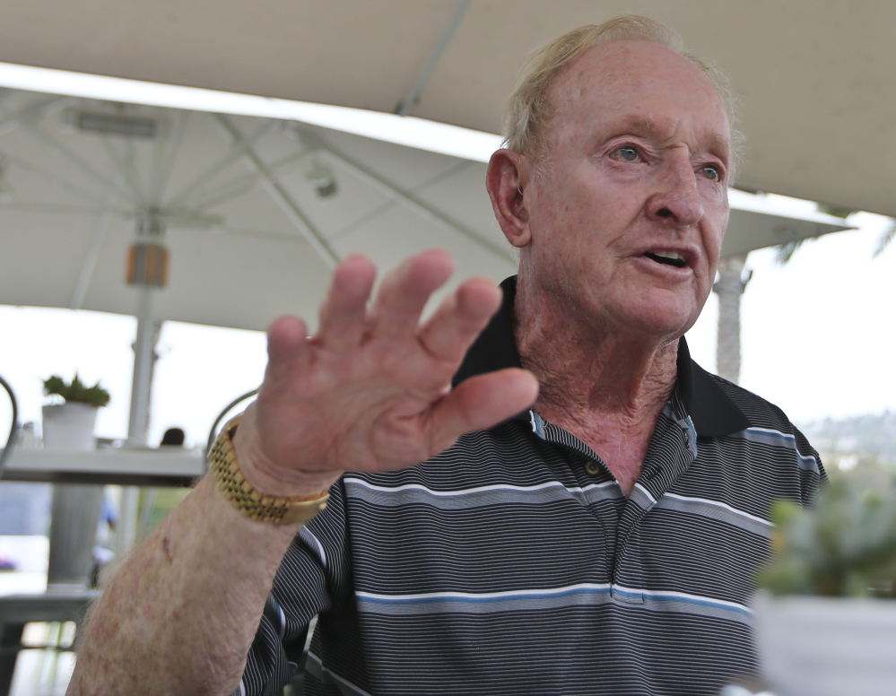 Rod Laver, now 77, knows how difficult it is to win a calendar-year tennis Grand Slam. He's the last man to do it, in 1969, and hopes Novak Djokovic can match him.