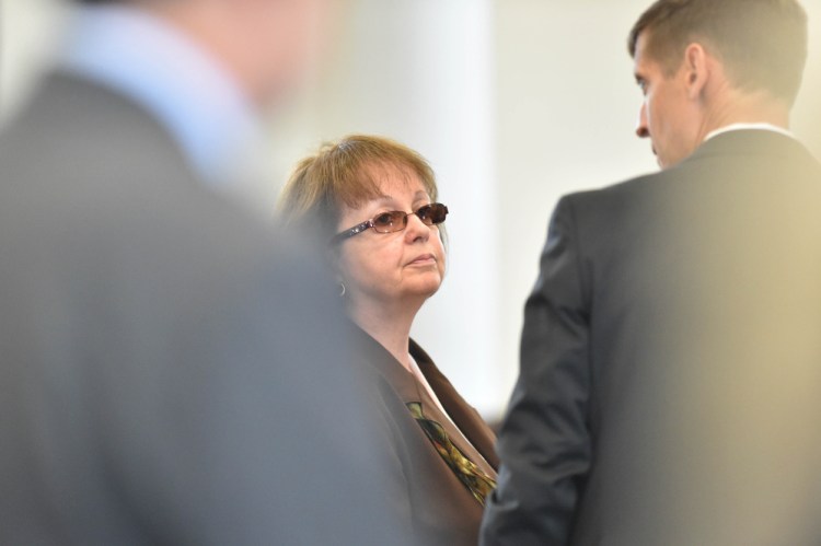 Claudia Viles speaks with her attorney, Walter McKee, after she was found guilty on 13 counts including felony theft at Somerset County Superior Court in Skowhegan on Wednesday. While hers is one of the biggest prosecuted cases of municipal theft in Maine history, many towns are also vulnerable.