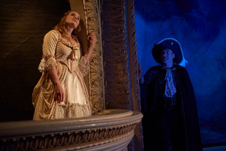 Christopher Holt as Cyrano watches his love interest, played by Marjolaine Whittlesey.