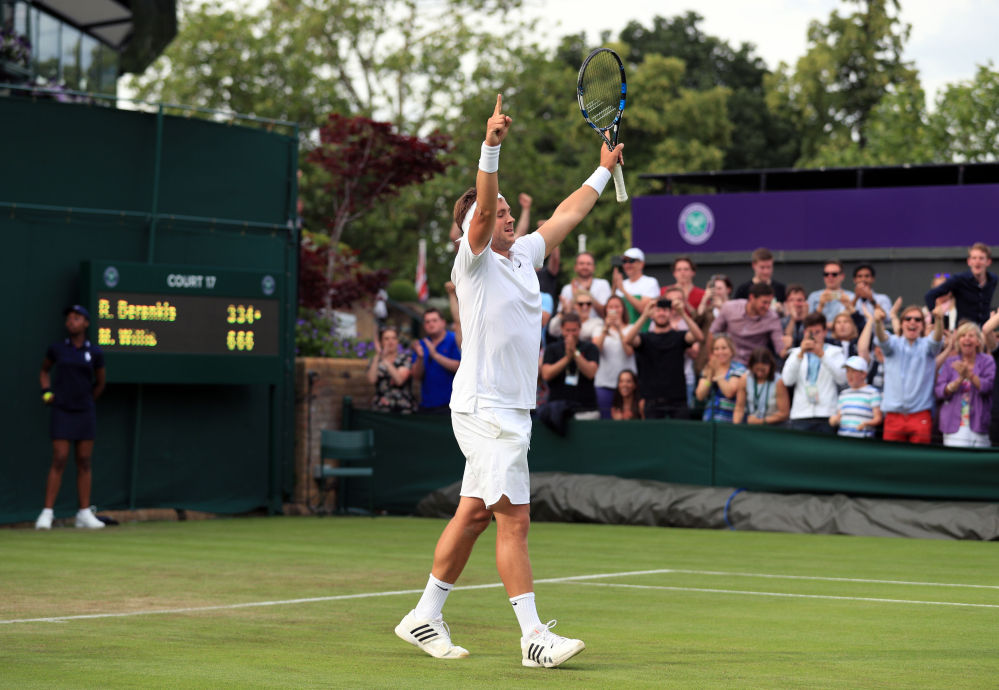 Britain's Marcus Willis, ranked 772nd in the world, celebrates his straight-sets victory Monday over 54th-ranked Ricardas Berankis of Lithuania on opening day of the Wimbledon Tennis Championships in London.