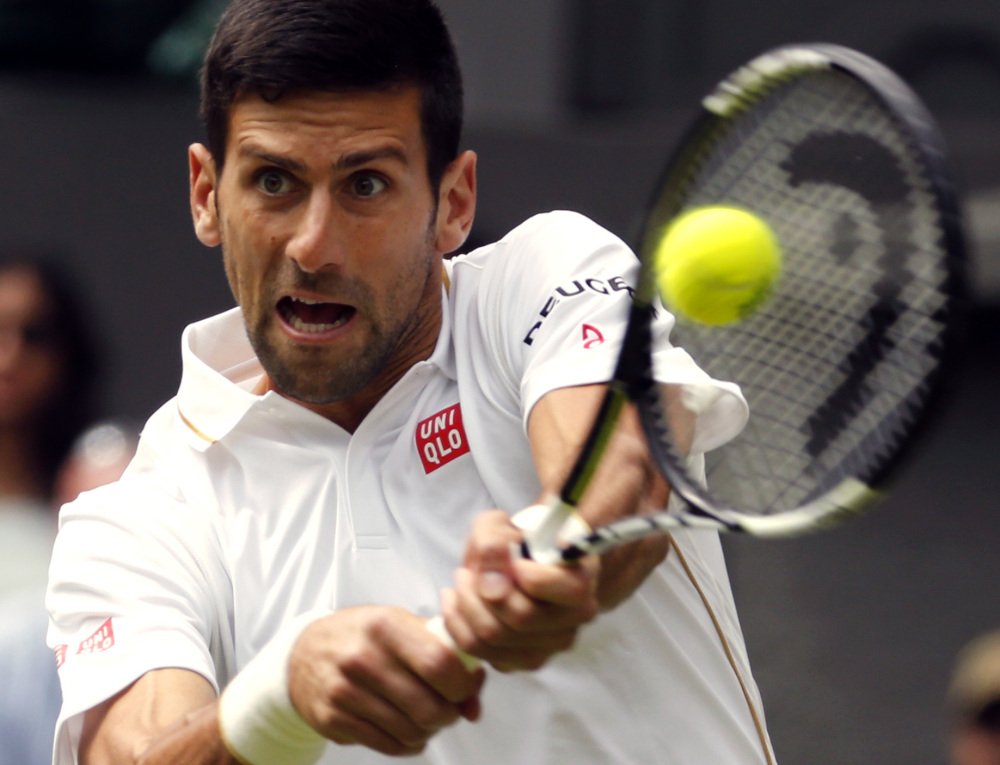 Novak Djokovic opened defense of his Wimbledon title with a 6-0, 7-6 (3), 6-4 victory Monday over James Ward.