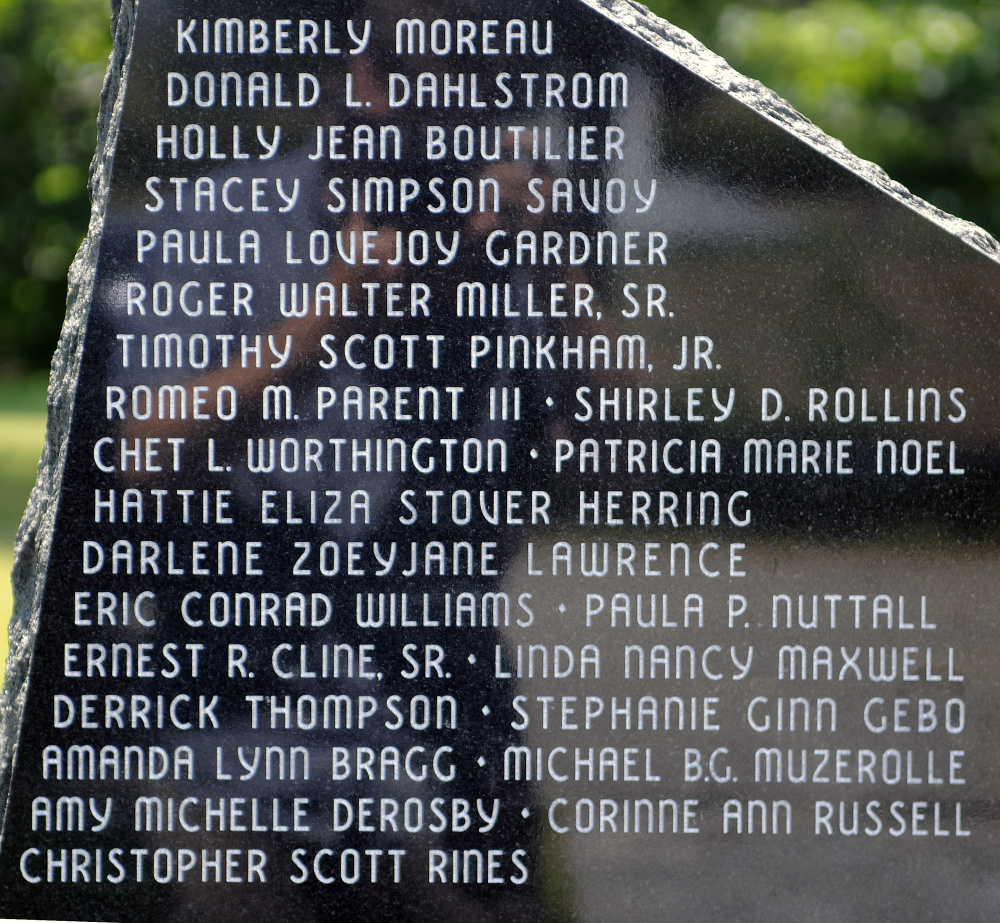 Some of the 107 names on the Maine Murder Victims' Memorial monument in Augusta, including, at the bottom, the 13 added this year.
