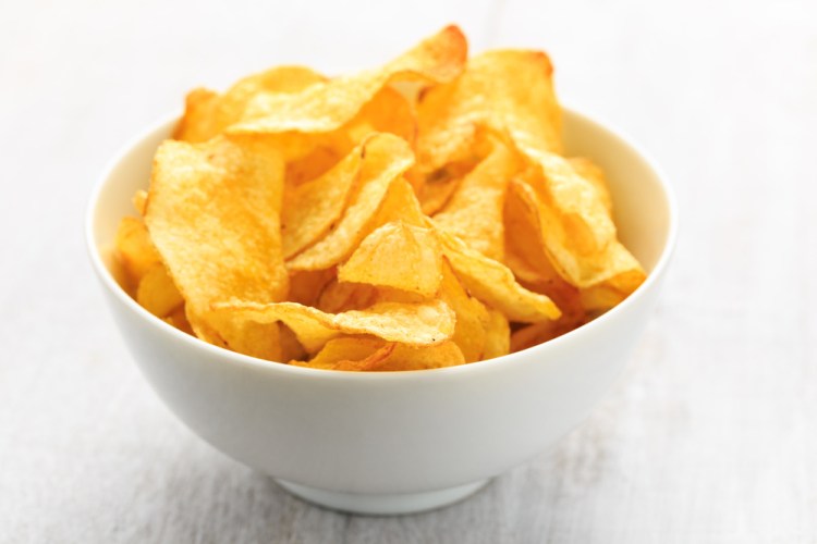 Potato chips don't have much redeeming nutritional value and the added salt in your diet can cause problems. 