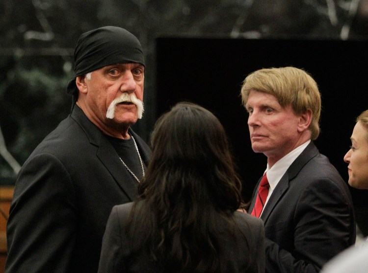 Hulk Hogan, whose given name is Terry Bollea, left, appears in court moments after a jury returned its decision in St. Petersburg, Fla., against news and gossip site Gawker. Gawker's parent company has filed for bankruptcy protection.