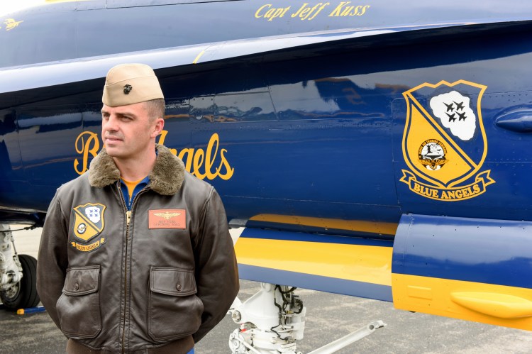 Marine Capt. Jeff Kuss poses with his Blue Angels F/A-18 fighter jet at an air show in Lynchburg, Va. in this May 19, 2016, photo. Matt Bell/The Register & Bee via AP