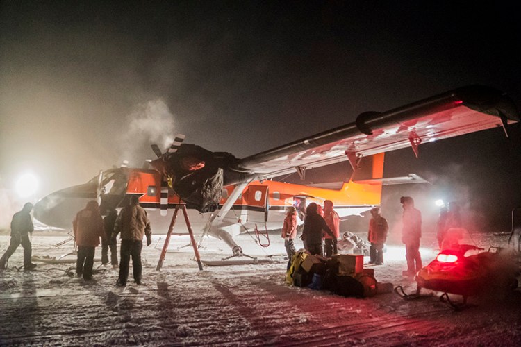 A small plane picks up sick workers at the U.S. South Pole science station.