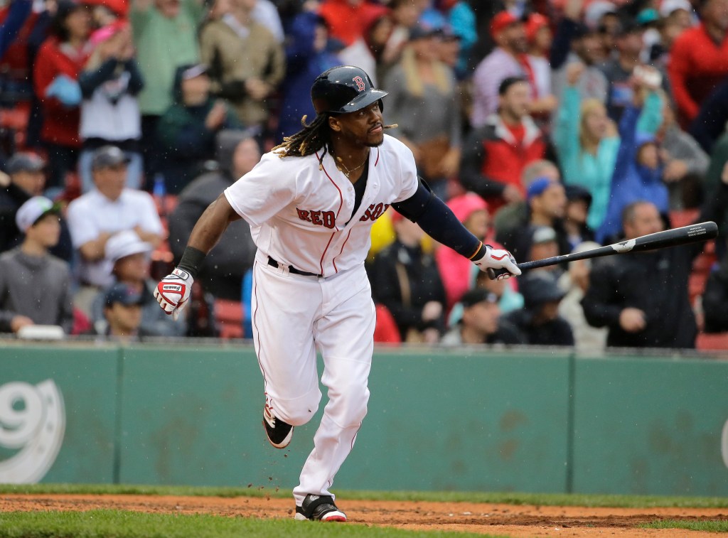 Boston Red Sox's Hanley Ramirez hits an RBI double in the ninth inning of Sunday's game against the Toronto Blue Jays in Boston. (AP Photo/Steven Senne)