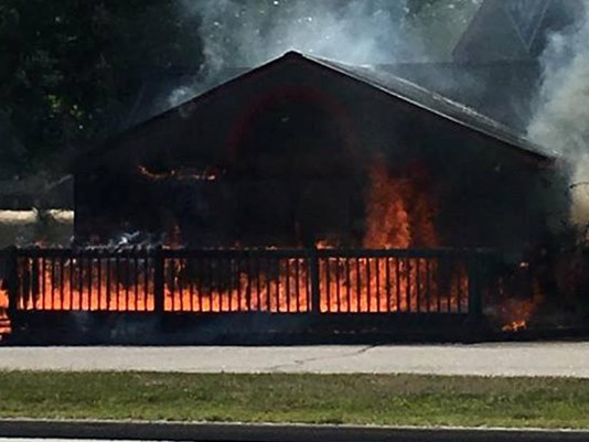 Fire started on a porch at Domino's Pizza in Windham on Monday afternoon.