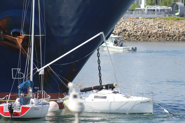 The 477-foot tanker Chem Venus broke the mast of one of the three sailboats it hit Wednesday in the Piscataqua River.