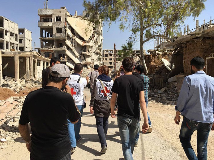 Members of the first convoy that delivered medicines and baby formula to Daraya in early June. A second convoy with food supplies arrived in the city on Thursday.