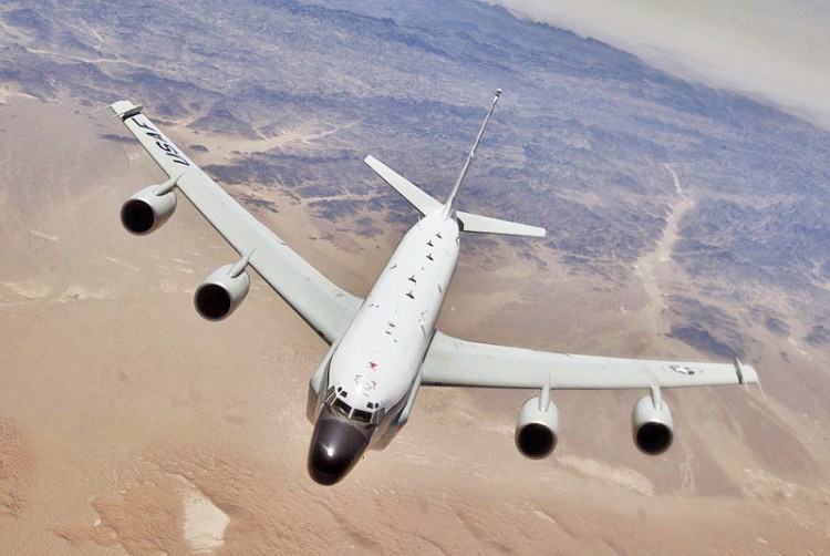 An RC-135  reconnaissance aircraft moves into position behind a KC-135T/R Stratotanker for refueling over Southwest Asia in this 2006 U.S. Air Force photo. "The root of relevant issues is that the frequent close reconnaissance on China's coast by U.S. military aircraft severely threatens China's air and maritime security," a Chinese Foreign Ministry spokesman says.