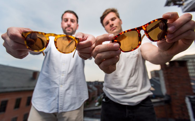 Daniel Dougherty of Yarmouth, left, and John Turner of Harpswell have drawn national attention for turning salvaged wooden lobster traps into designer sunglasses.