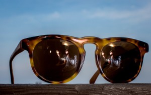 PORTLAND, ME - JULY 7: John Turner and Daniel Dougherty are reflected in a pair of Traps Eyewear sunglasses. The entreprenuers' line of sunglasses have received national attention turning salvaged wooden lobster traps into temples and earpieces. (Photo by Ben McCanna/Staff Photographer)
