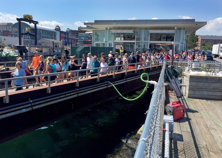Lines form for a Casco Bay Lines ferry in July.