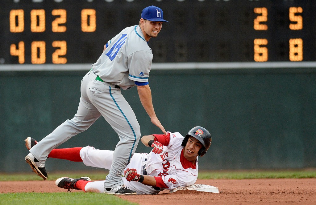 Portland's Mauricio Dubon tries to break up a double play on Benjamin Michael of the Hartford Yard Goats in Friday's first game. Shawn Patrick Ouellette/Staff Photographer