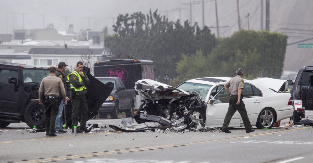 Los Angeles County Sheriff's deputies investigate a fatal crash in Malibu, Calif., in February of last year. U.S. traffic fatalities rose 7.7 percent to 35,200 in 2015, according to the National Highway Traffic Safety Administration.