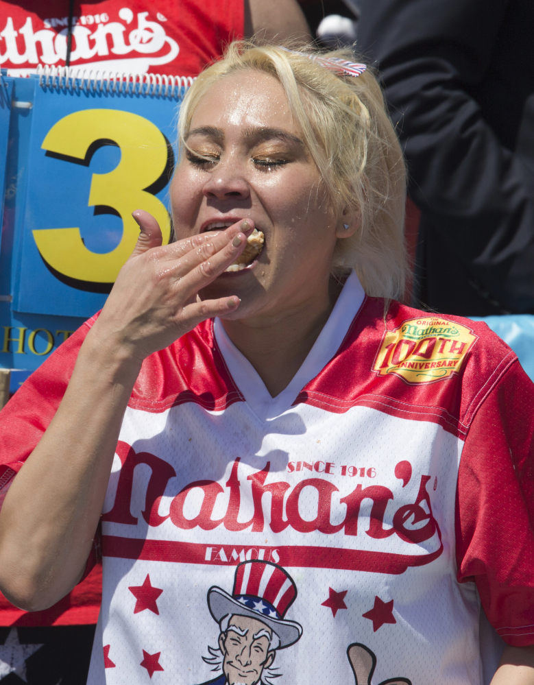 Miki Sudo competes in Nathan's Famous Fourth of July International Hot Dog Eating Contest woman's competition Monday.