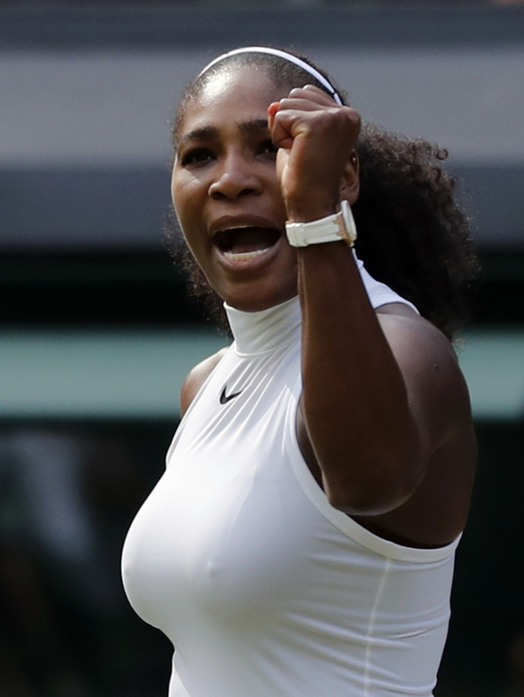 Serena Williams of the U.S celebrates after beating Anastasia Pavlyuchenkova of Russia in a women's singles match on day nine in London.