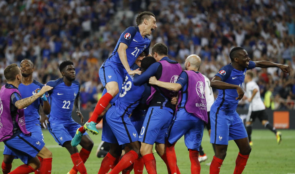 France's players celebrate after Antoine Griezmann scored his team's second goal during the Euro 2016 semifinal soccer match between Germany and France, at the Velodrome stadium in Marseille, France on Thursday. France won, 2-0, and advanced to Sunday's final against Portugal.