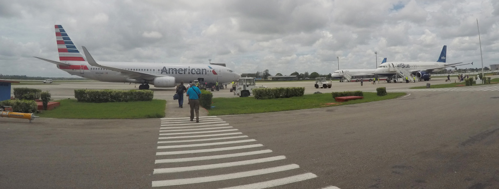 American Airlines and JetBlue Airways charter flights wait to depart from Havana's Jose Marti International Airport on June 10. A move to allow commercial airlines to fly to Cuba is the latest development in President Obama's effort to normalize U.S.-Cuba relations.