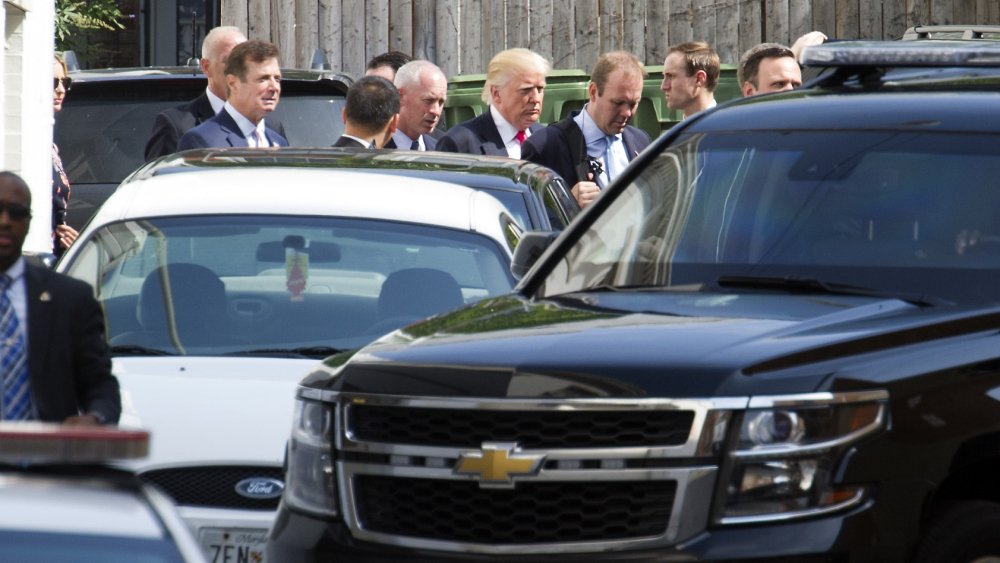 Republican presidential candidate Donald Trump leaves a meeting with Republican House members at the Capitol Hill Club in Washington on Thursday.