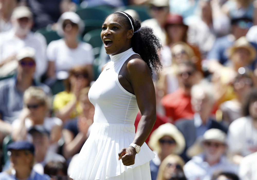 Serena Williams of the U.S celebrates after beating Elena Vesnina of Russia inter women's singles match on day eleven of the Wimbledon Tennis Championships in London, Thursday, July 7, 2016. Associated Press/Kirsty Wigglesworth