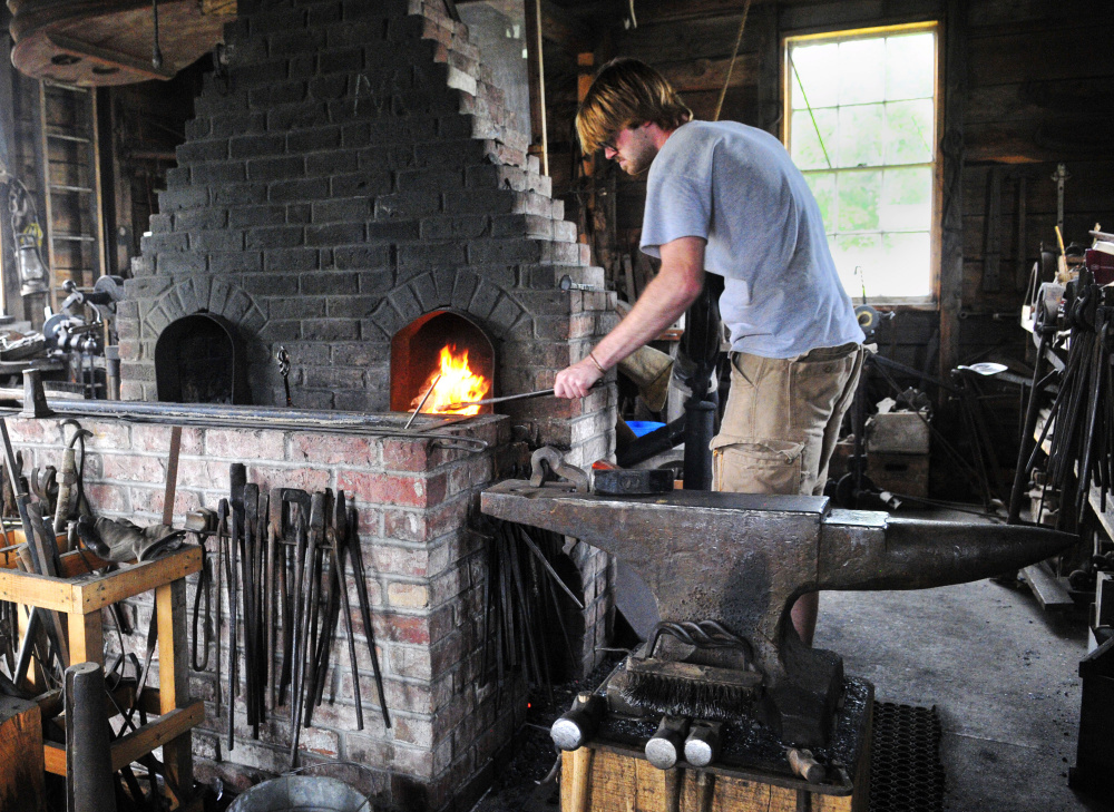 Robert Stevens works in the blacksmith shop at the Windsor Fairgrounds. 