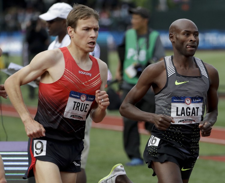 Ben True, left, races Bernard Legat during the men's 5,000 meters at the U.S. Olympic trials in Eugene, Ore. Lagat won and True was fifth. True will compete in the Beach to Beacon 10K in August.