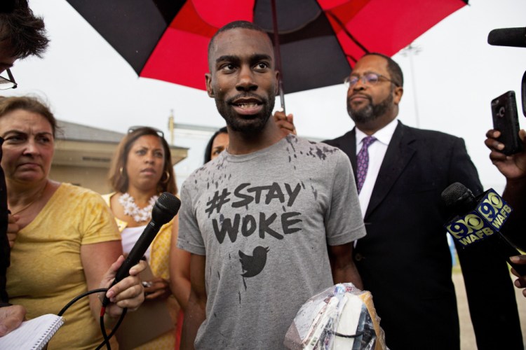 Black Lives Matter activist DeRay Mckesson talks to the media after his release from the Baton Rouge jail in Louisiana on Sunday.
AP Photo/Max Becherer