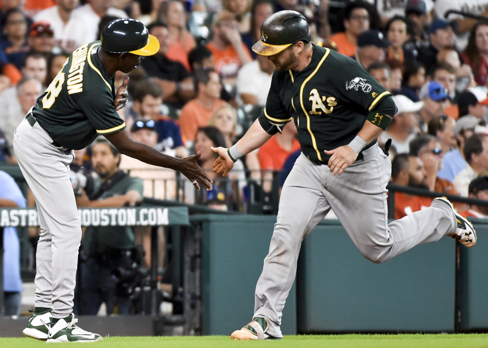 Stephen Vogt, right, will be the Oakland Athletics' only representative at the All-Star Game and that's just fine. It will give fans of his team a reason to tune in to the game.