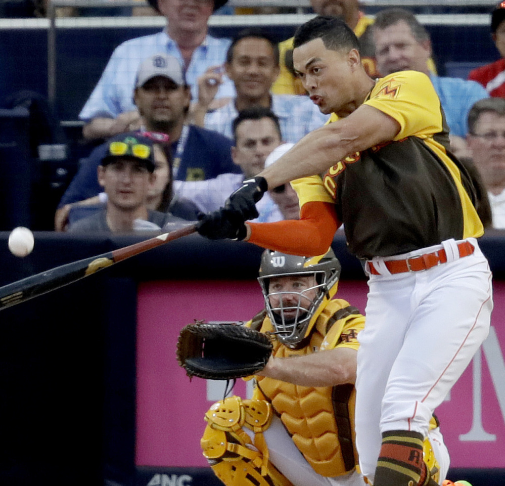 Giancarlo Stanton of the Miami Marlins was a total hit Monday night during the Home Run Derby portion of the All-Star events in San Diego. Stanton finished with a record 61 homers in the three rounds.