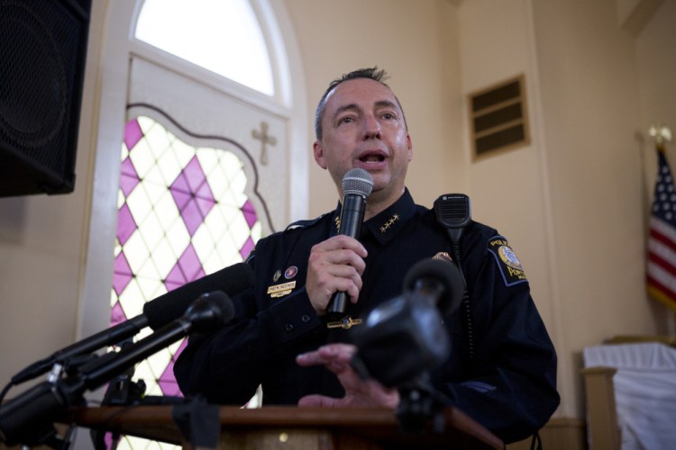 Portland Police Chief Michael Sauschuck speaks to the crowd of over 200 hundred people inside and outside Green Memorial AME Zion Church last week.