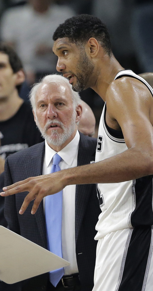 Spurs Coach Gregg Popovich and Tim Duncan won more games together than any player-coach combination in NBA history. Duncan retired Monday.