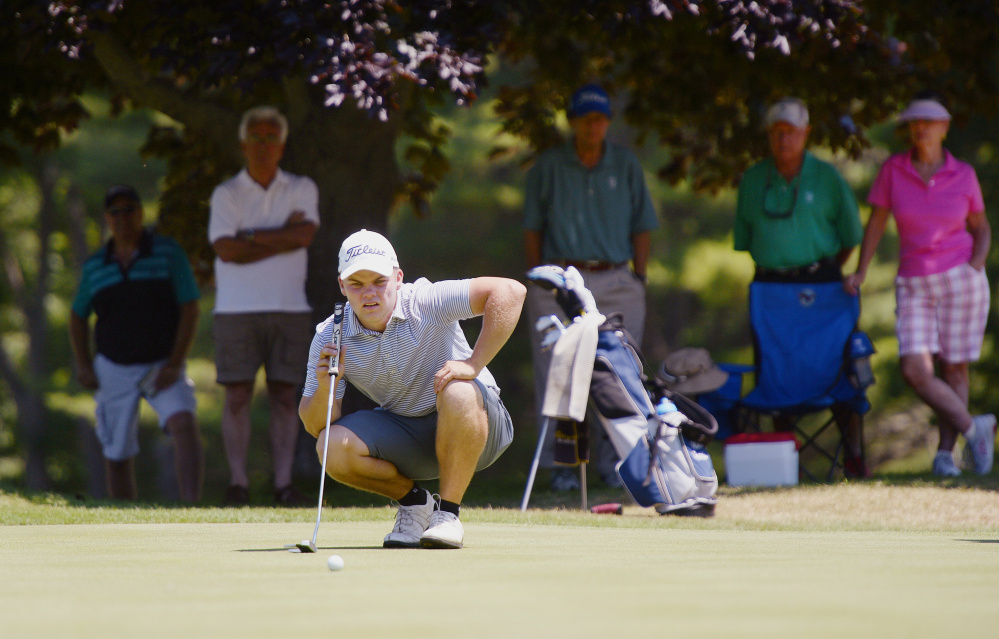 Matt Hutchins of The Woodlands Club in Falmouth lines up a shot on the 17th green during the 97th Maine Amateur golf tournament at the York Golf & Tennis Club Wednesday. (Shawn Patrick Ouellette/Staff Photographer)