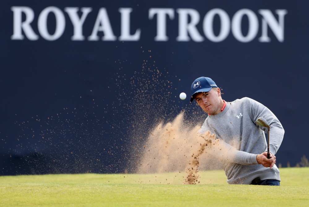 Jordan Spieth plays out of a sand trap Wednesday on the 18th green during a practice round prior to the British Open which starts Thursday at the Royal Troon Golf Club in Troon, Scotland.
